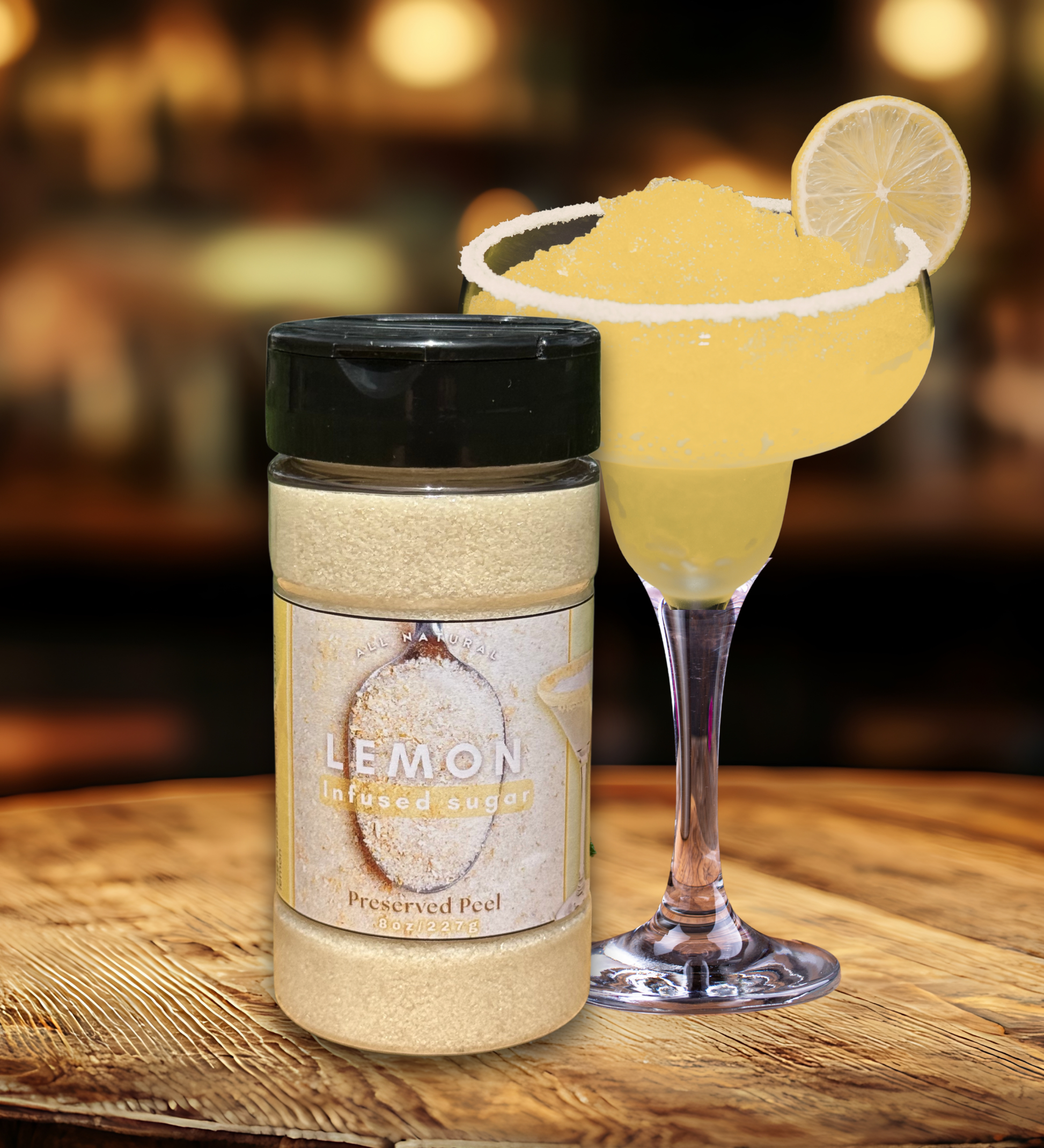 Jar of lemon-infused sugar next to a lemon-themed cocktail on a wooden surface.