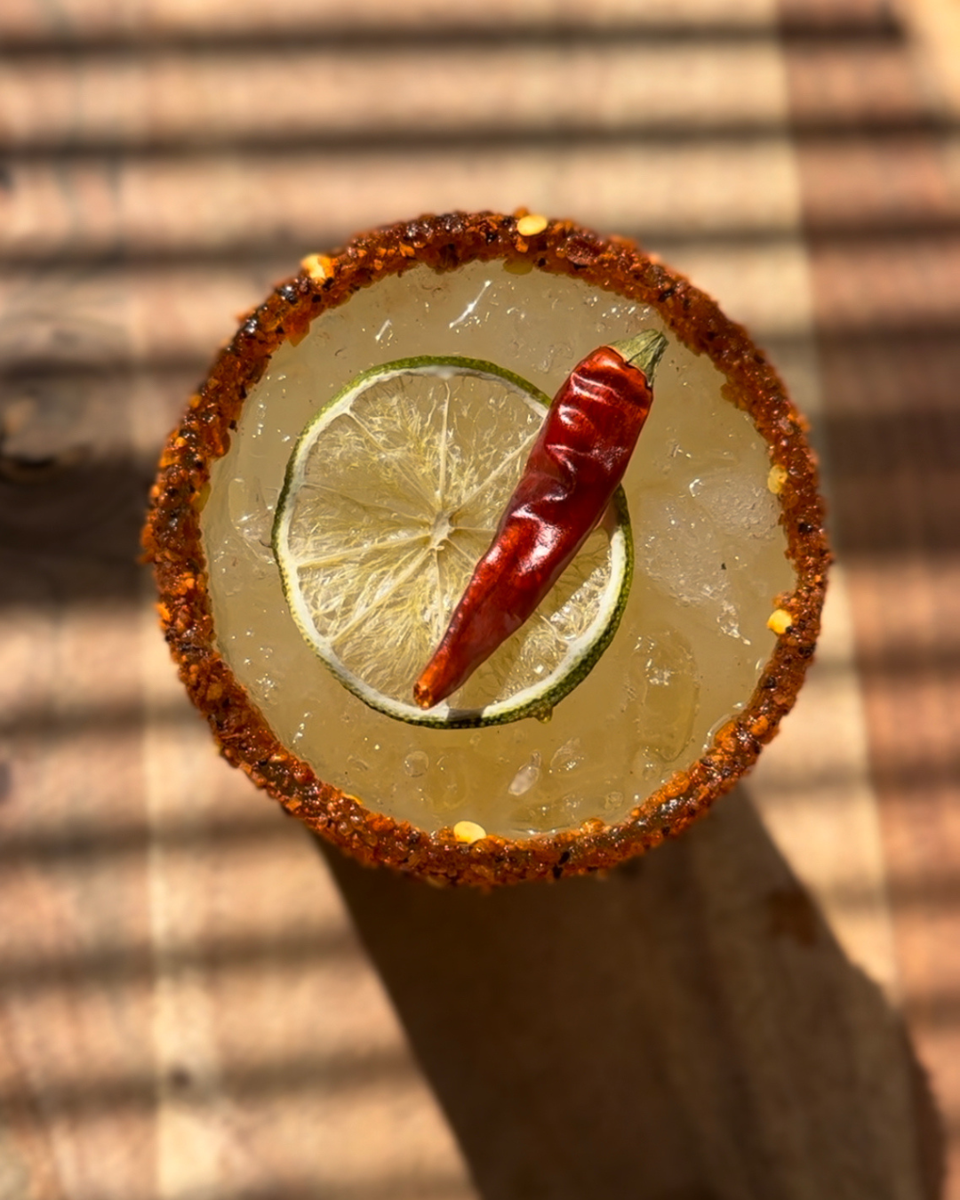 spicy margarita garnished with dried sichuan peppers from Preserved Peel